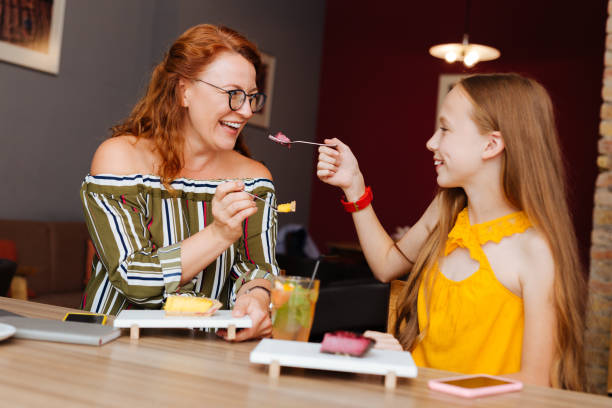 istock Blonde-haired daughter feeling loved while celebrating birthday 1001396350