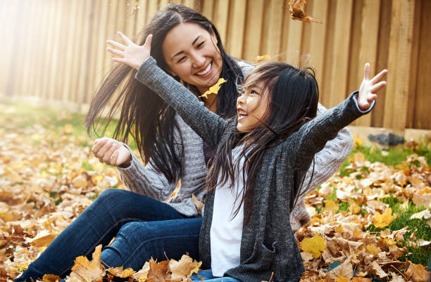 istock Pile on the leaves, piles of fun 1001404504