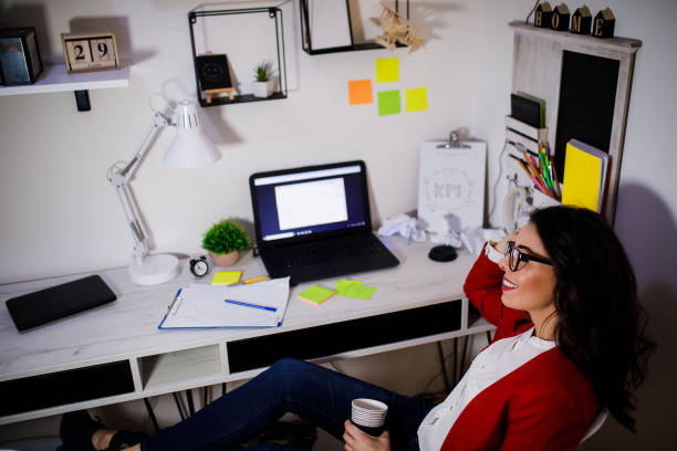 istock Young freelance working on laptop in home office 1001405872