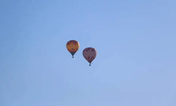 Hot Air Balloon. bright beautiful colored balloons fly over the city. Festival of Aeronautics "LIGHT PEOPLE".