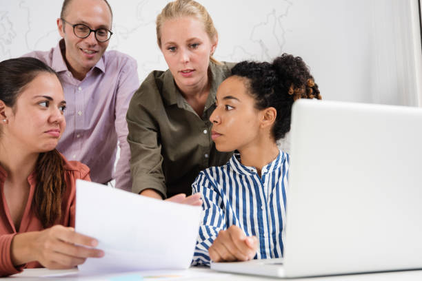 istock Business team in a meeting discussing a document 1001419860