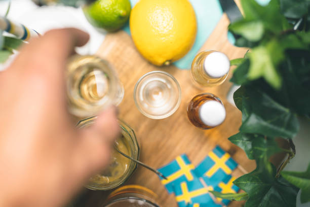 Drinking schnapps at a Swedish midsummer dinner party