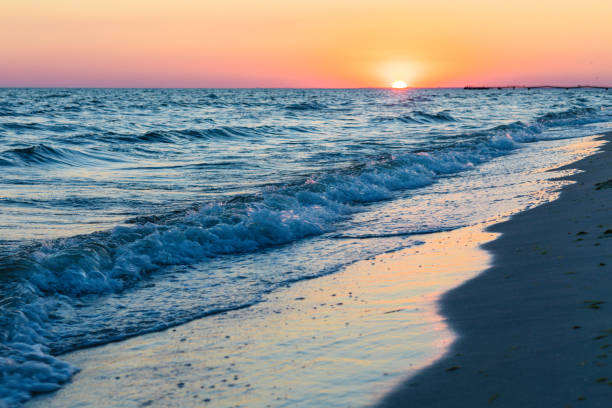 istock Sun goes to the sunset over the sea 1001434244