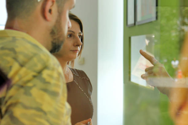 istock Young Man discussing with two women 1001435272