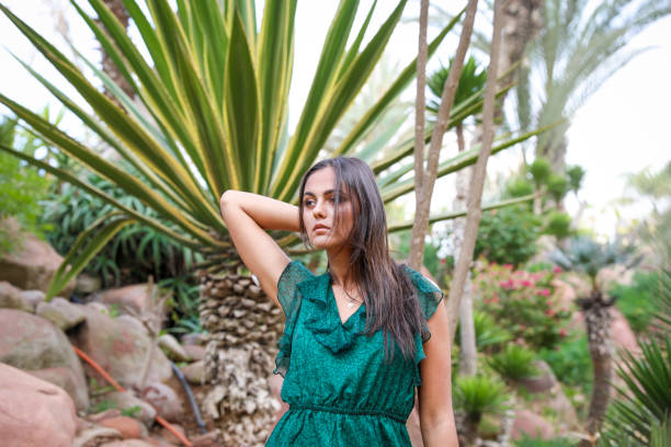 istock Chic girl in a long evening dress. 1001437552