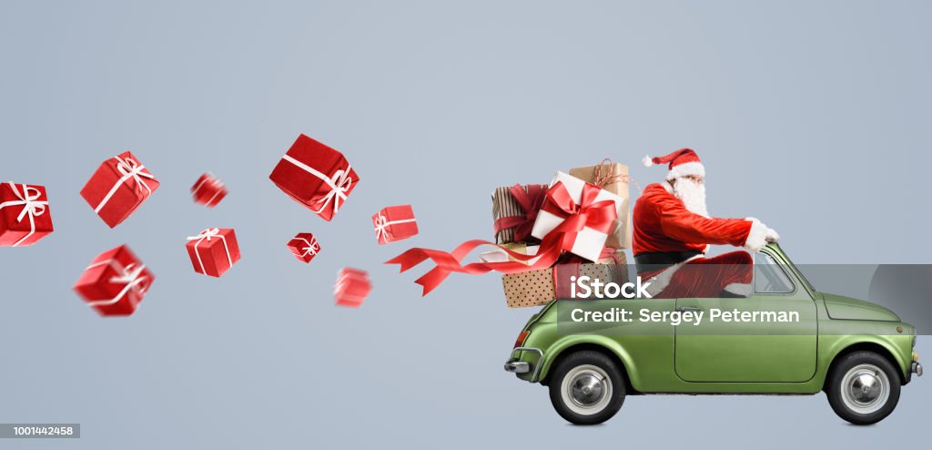 Babbo Natale in auto - Foto stock royalty-free di Babbo Natale