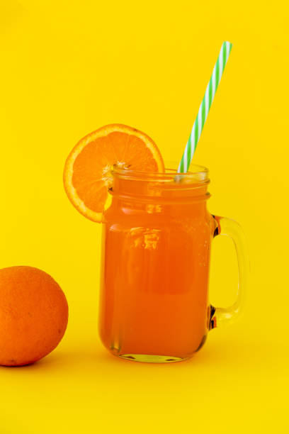 istock Fresh orange juice in the glass jar 1001442840