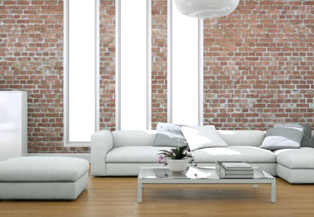 istock Modern bright living room interior design with sofas and stonewall 1001466120