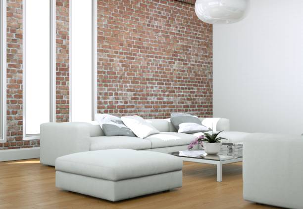 istock Modern bright living room interior design with sofas and stonewall 1001466228