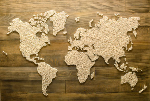 istock Handmade world map on wooden background for home decoration, top 1001468906