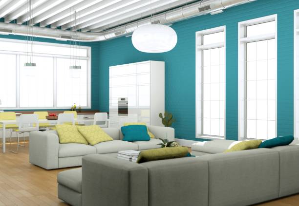 istock Modern bright living room interior design with sofas and blue wall 1001476134