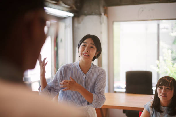 istock Business women having discussion 1001482454