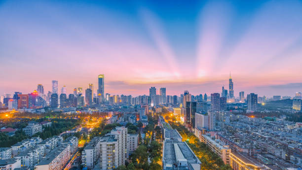 istock NanJing，China.Red sky, beautiful sunset, city building 1001482786