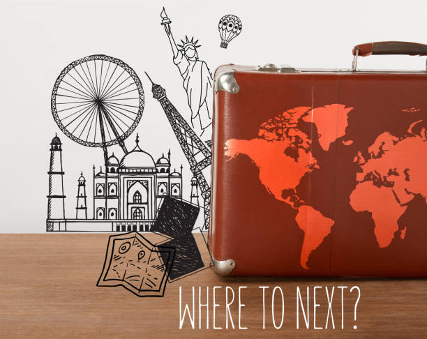 istock Brown vintage suitcase with map and travel illustrations 1001487450