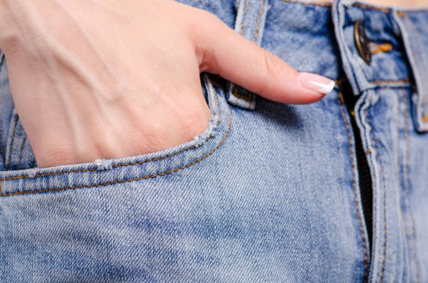 istock Woman in jeans pocket macro 1001490710