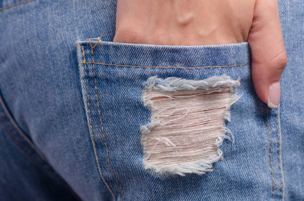istock Woman in jeans pocket macro 1001490970