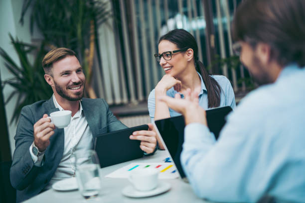 istock Relaxed creative people brainstorming in the office 1001495980