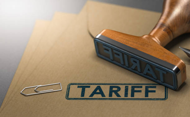 Tariff, Taxes on Imported Goods 3D illustration of a rubber stamp with the word tariff stamped on paper background. Concept of taxes or duties on imported goods. tarifs stock pictures, royalty-free photos & images