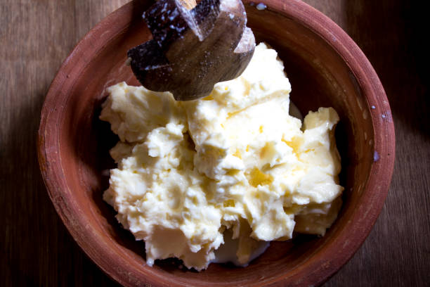 Image of white butter make at home from milk and its cream