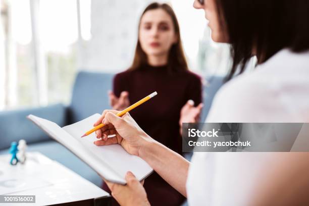 Talking Problem Homepathy Emotional Patient Talking About Her Problem And A Doctor Making Notes ...