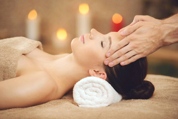 istock Smiling Woman Getting Massage in Health Spa 1001525048