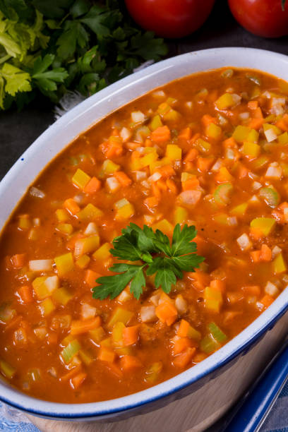 istock fish with vegetables in tomato sauce 1001530064