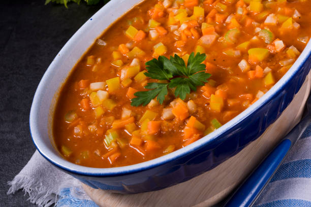istock fish with vegetables in tomato sauce 1001530244