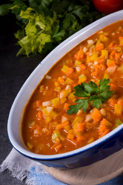 istock fish with vegetables in tomato sauce 1001532940