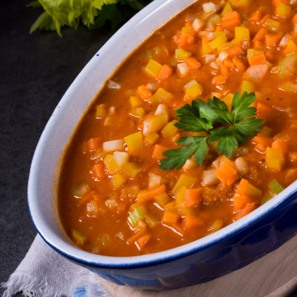istock fish with vegetables in tomato sauce 1001533058