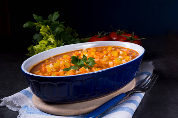 istock fish with vegetables in tomato sauce 1001533160