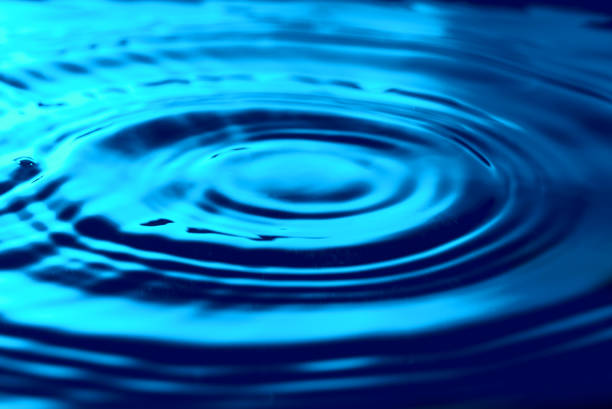 istock Blue water rippled texture. Abstract natural background. Water ripples. 1001549596