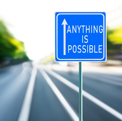 Anything is Possible Road Sign on a Speedy Background.
