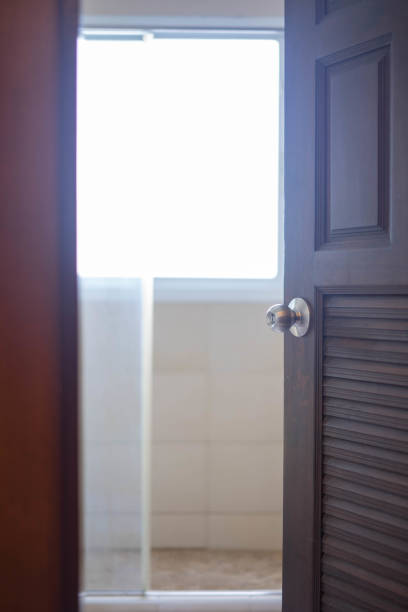 istock Opened wooden door 1001563802