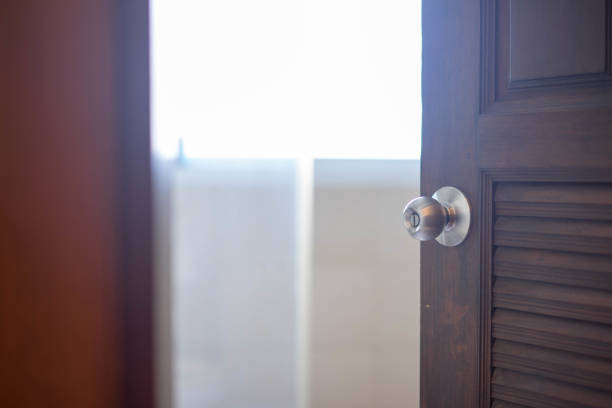 istock Opened wooden door 1001563806
