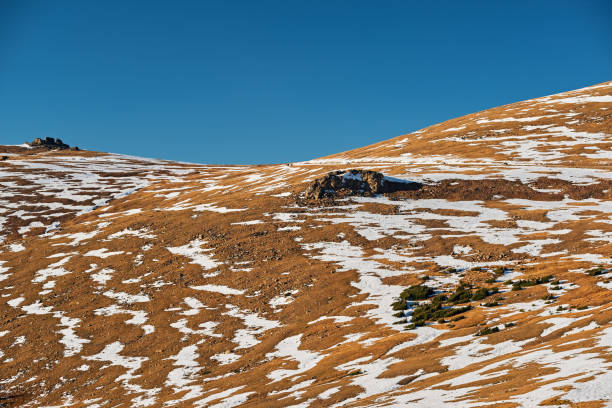istock High alpine tundra landscape with mountains 1001567546