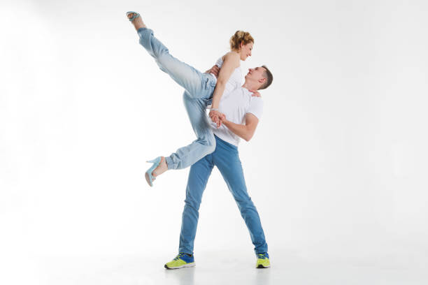 istock beauty couple dancing  on grey background 1001571558