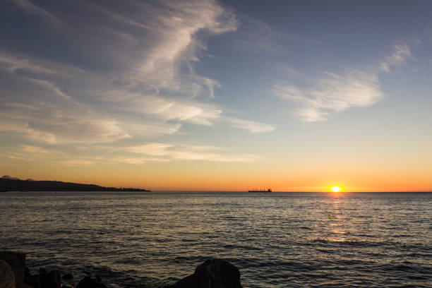 istock Sunset at sea horizon 1001572334
