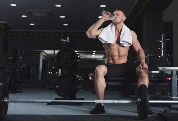 istock Muscular bodybuilder rest after deadlifts at gym 1001575806