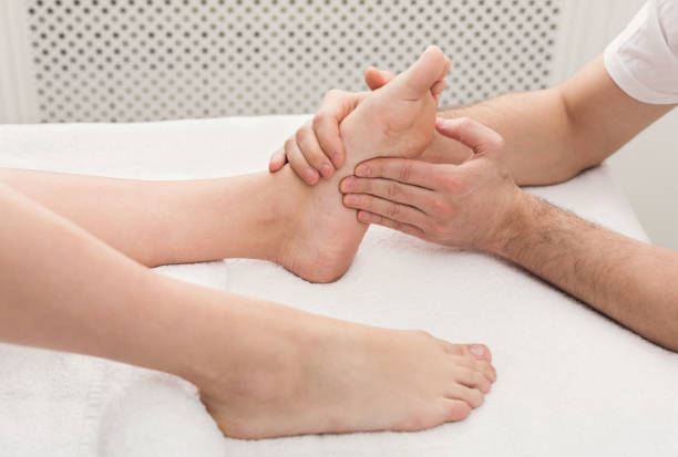 istock Feet massage closeup, acupressure 1001583816