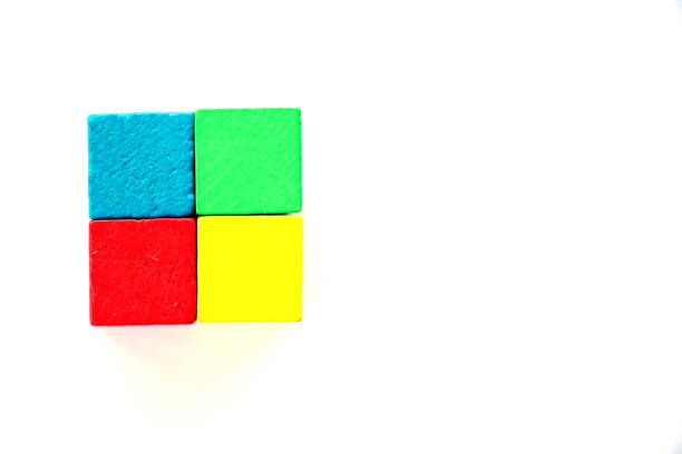 istock Green, blue, yellow, red square wood assemble to large square on white background 1001589072