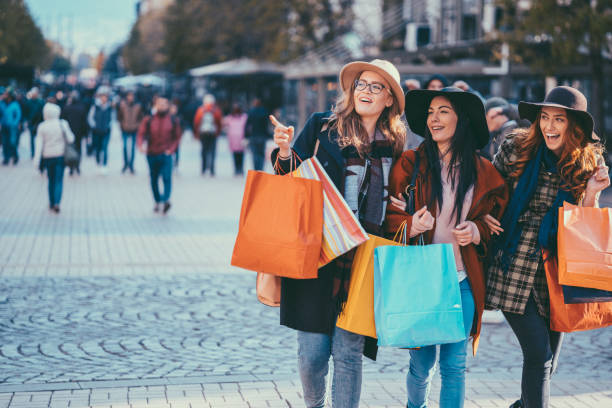 istock Young shopaholics in the city 1001589136