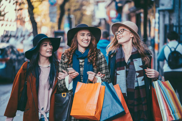 istock Young shopaholics in the city 1001591306