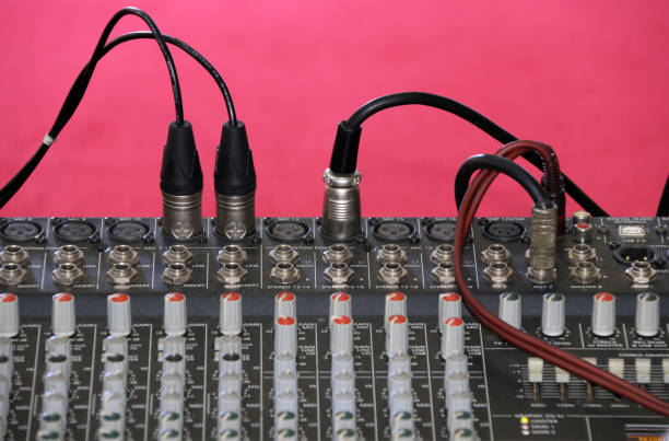 istock Channel Mixer for sound audio. mixing console for electro acoustics with red background. 1001595238