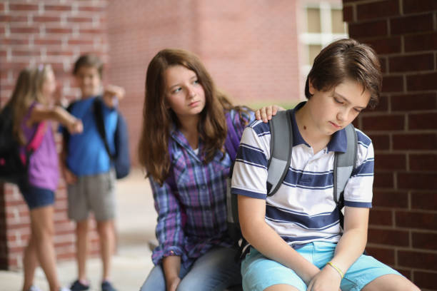 istock Comforting friend after being bullied. 1001596694