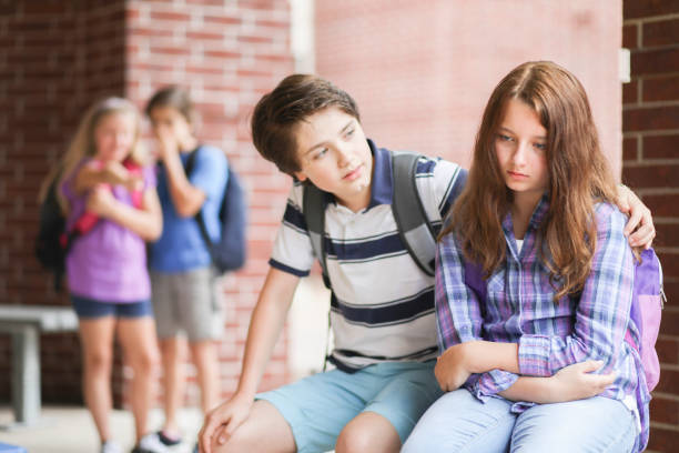 istock Comforting friend after being bullied. 1001596716