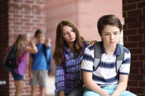 istock Comforting friend after being bullied. 1001596880