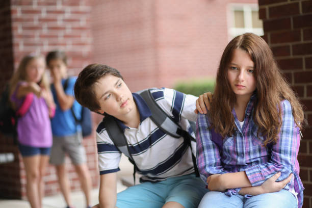 istock Comforting friend after being bullied. 1001597102