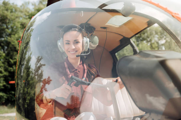 istock Optimistic happy woman training for piloting 1001597696