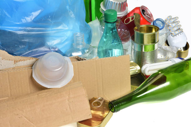 istock trash for recycling with paper glass bottles, cans, plastic bottle, light bulb 1001600868