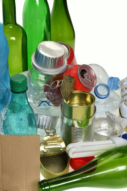istock trash for recycling with paper glass bottles, cans, plastic bottle, light bulb 1001600892